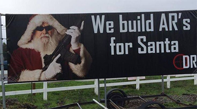 Billboard of Santa Holding an AR 15 Causes Locals to Talk