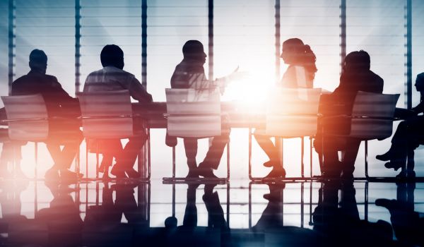 Group of Business People Meeting Back Lit Concept