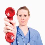 Healthcare professional with red phone