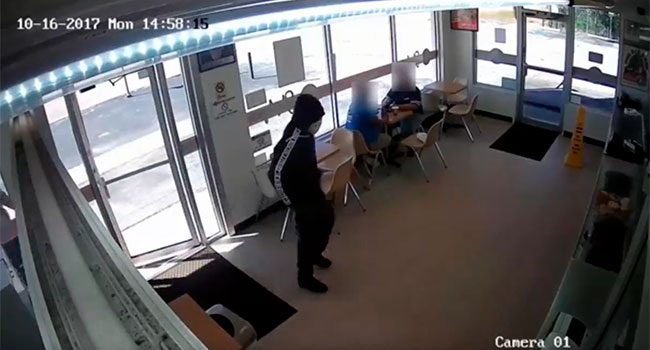 Men Rob Shipley Do-Nuts, Hand Out Donuts to Customers