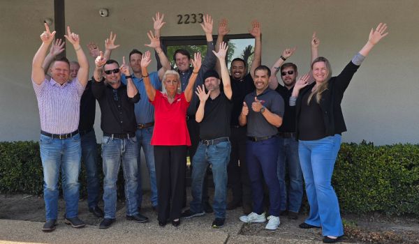 A group photo of employees from ACT Low Voltage