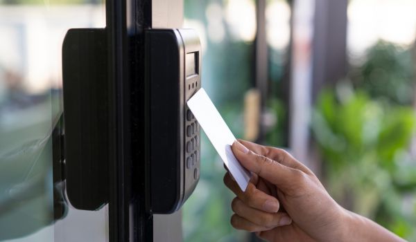 young woman using RFID tag key