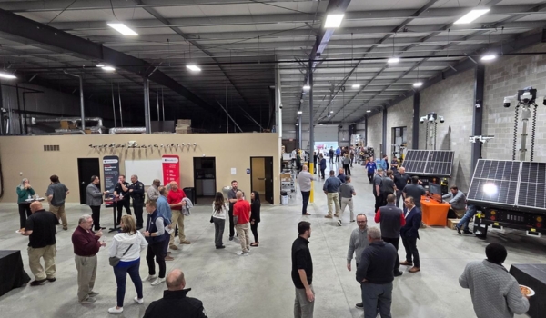 New EOS facility inside with people walking around