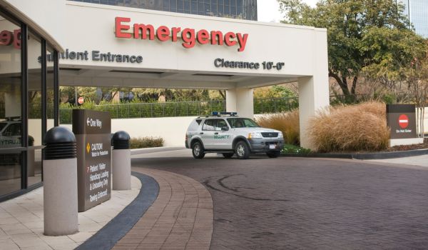 Emergency entrance of hospital with security vehicle