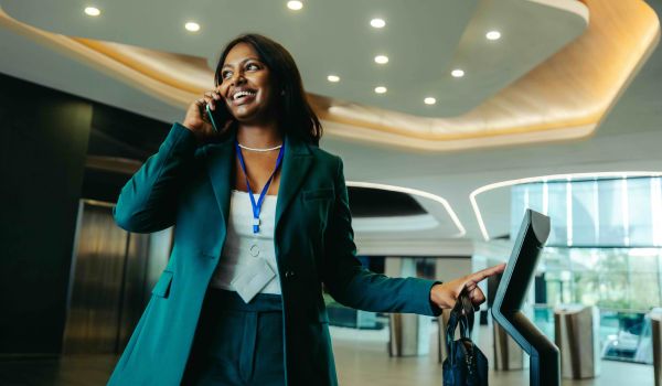 Person scanning into building lobby