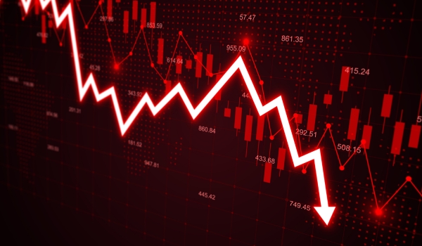 Stock market losses and bankruptcy with descending trading graph and downward arrows showing financial crisis