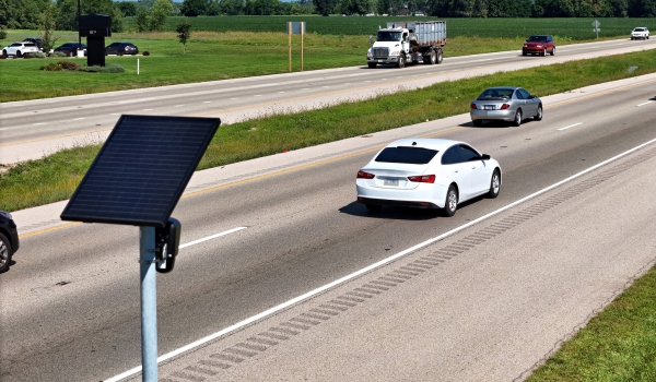 Solar powered ALPR security camera watching the community