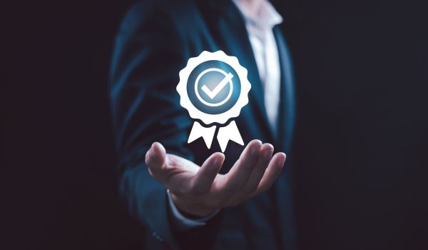 business quality with control checks concept with person in background