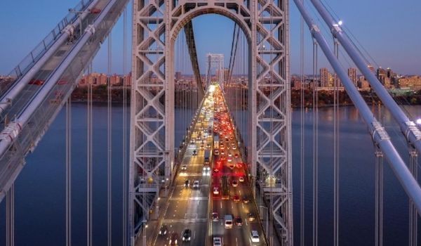 Aerial view of a bridge with cars driving