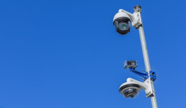 Three surveillance cameras on a pole, a high resolution camera with night vision, automatic number plate recognition (ANPR) and a 360 panoramic view camera