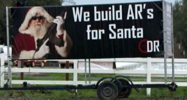 Billboard of Santa Holding an AR 15 Causes Locals to Talk