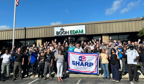 Boon Edam staff outside of building