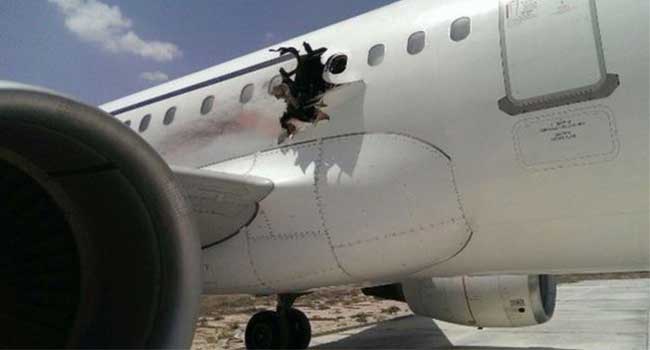Video Surveillance Captures Airport Workers with Laptop Used in Somalia In-Flight Jet Blast