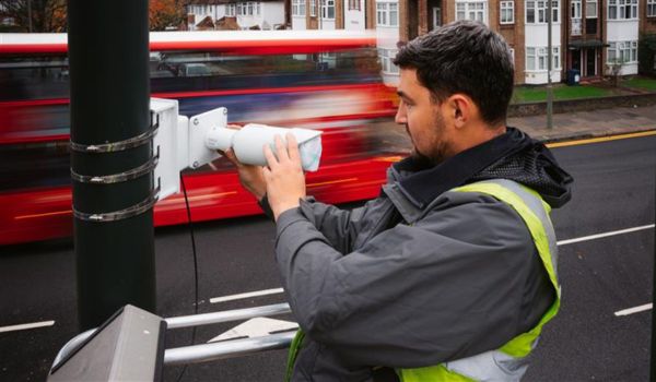 Person installing security camera