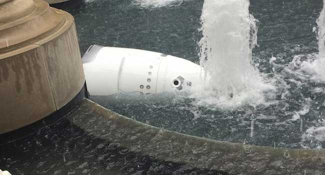 Security Robot Plunges Into Fountain