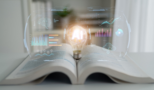 A glowing lightbulb labeled "AI" rests in the center of an open book, surrounded by futuristic digital interface graphics with data charts, graphs, and icons.