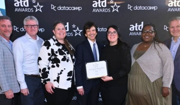 Rosideo employees receiving an award