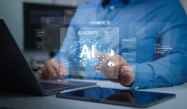 A person using a laptop with glowing digital interface overlays displaying "AI AGENTS" and AI graphics.