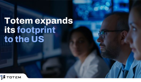 Professionals in control room with text overlay