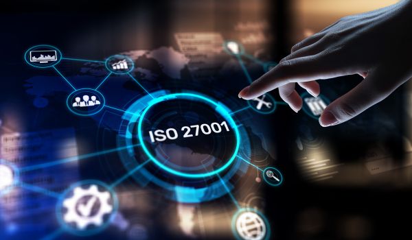 ISO 27001 Concept art with hand reaching for digital overlay