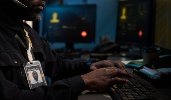 Dispatcher on duty working on computer