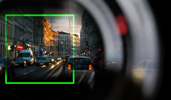 Camera scanning cars in traffic