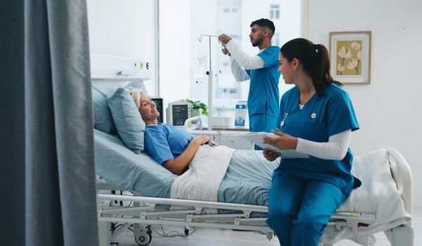 Nurse, clipboard and happy old woman in hospital bed for medical assessment, good news or recovery