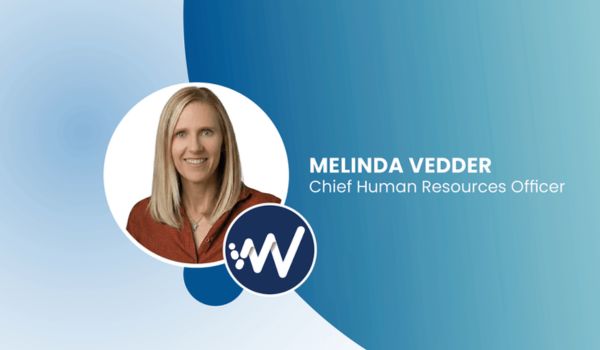 Headshot of Melinda Vedder on blue background