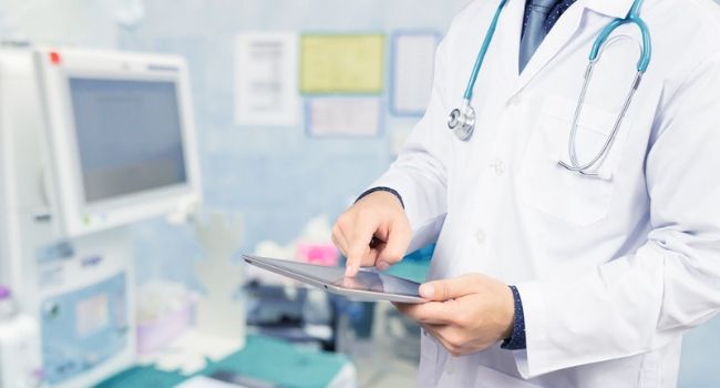 healthcare working using tablet