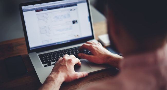 man on computer