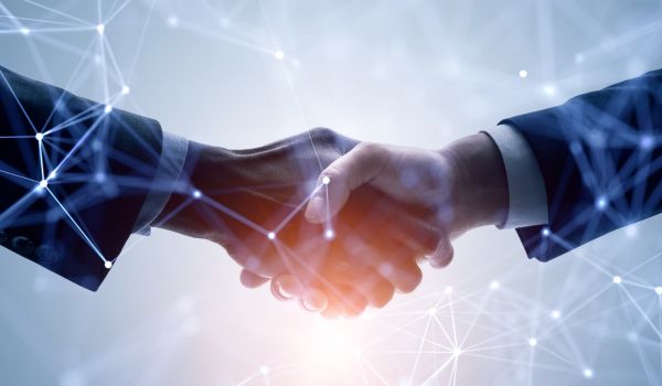 Two people shaking hands