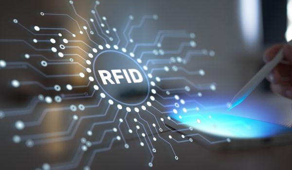 RFID graphic overlay on image of person holding a stylus