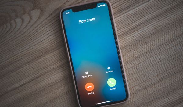 Cellphone with incoming call from a scammer