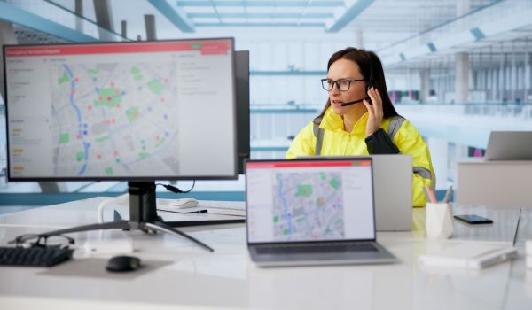 Emergency response worker at desk