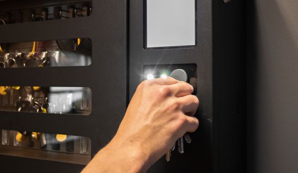 Person unlocking key cabinet
