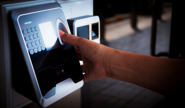 Person scanning their fingerprint